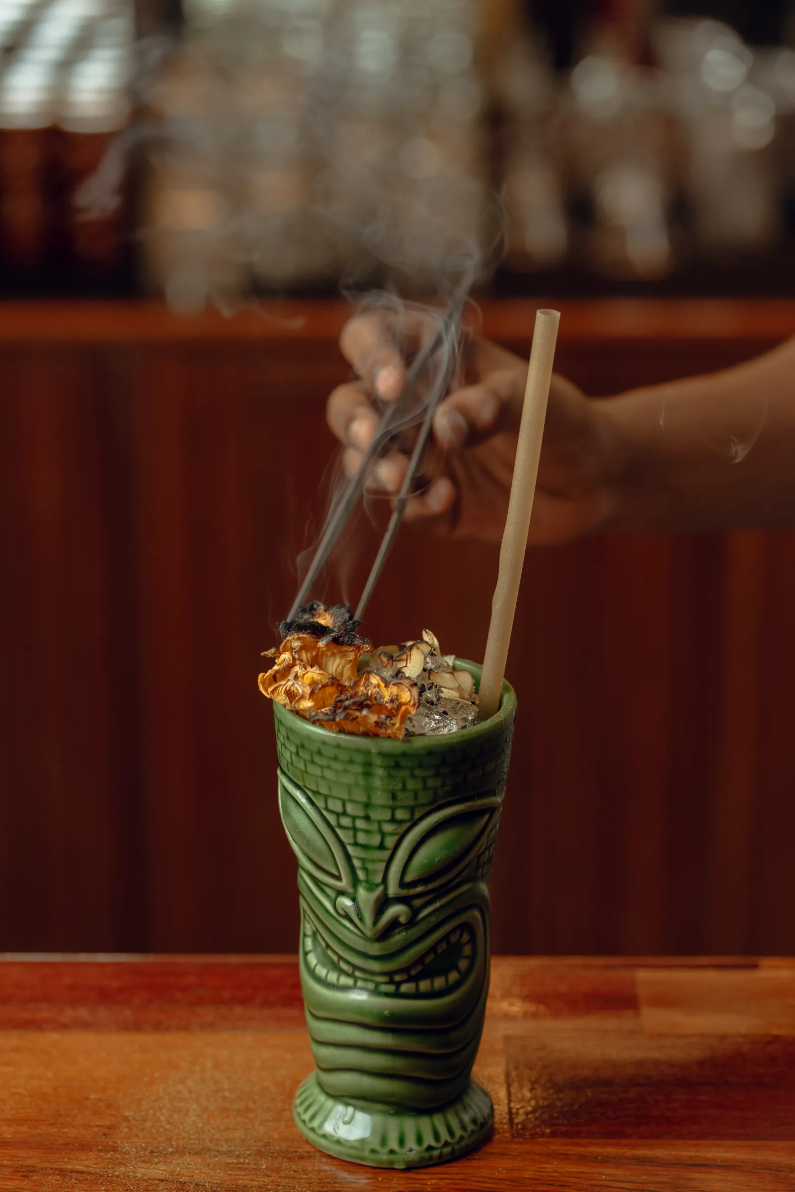 The Tiki Tiki served in a carved green tiki mug