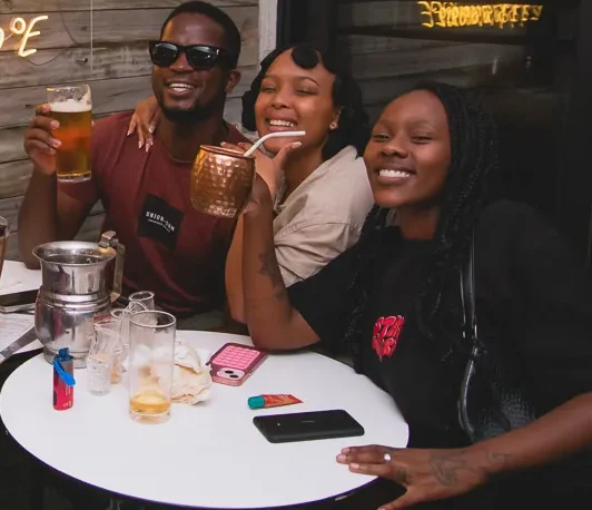 Friends raising a toast at Amigo