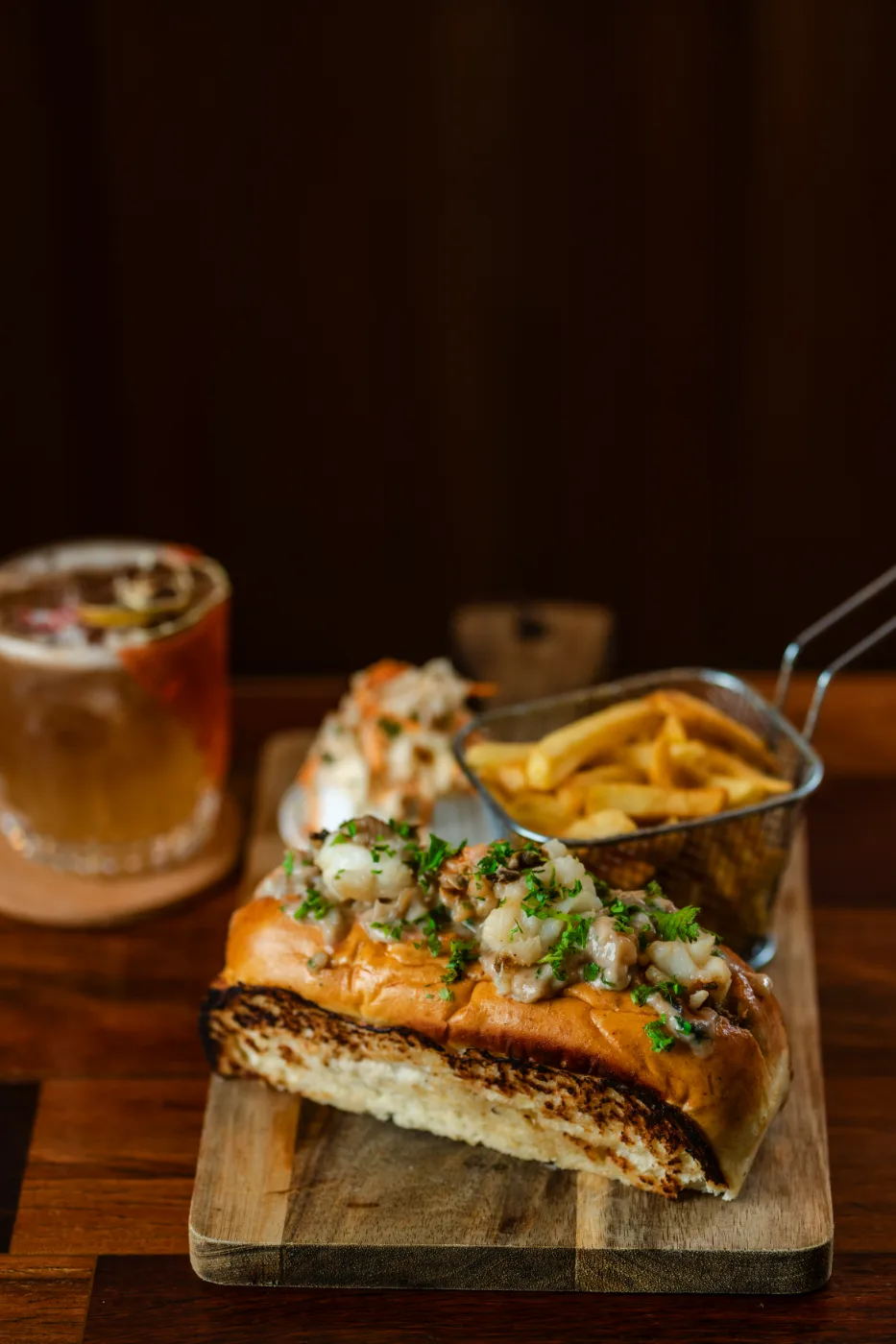 Amigo Bar & Bistro lobster roll with fries and house slaw